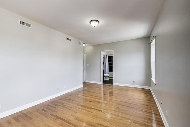 2618 W Rosemont Ave Unit 3, Chicago, IL 60659 - empty room with light wood-style flooring