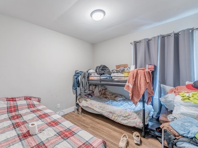 721 Lacy Ave, Streamwood, IL 60107 - bedroom with wood finished floors and baseboards