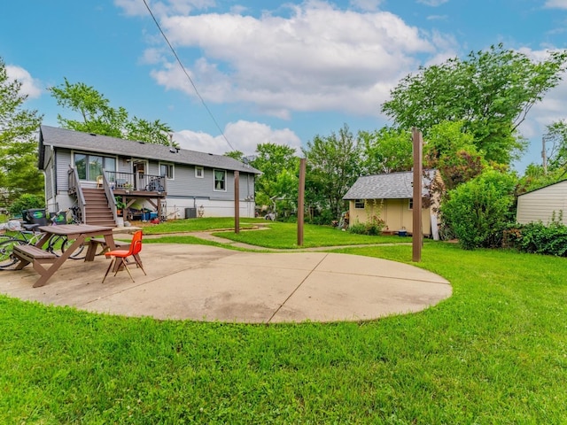 721 Lacy Ave, Streamwood, IL 60107 - back of property featuring a patio, stairs, a lawn, and a wooden deck