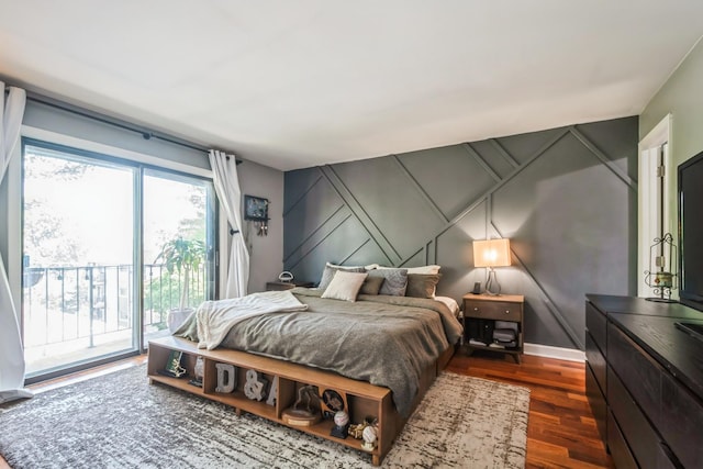 6221 N Niagara Ave Unit 507, Chicago, IL 60631 - bedroom with a decorative wall, access to outside, dark wood-style flooring, and an accent wall