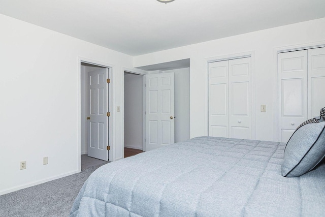3 Laurel Ct, Galena, IL 61036 - carpeted bedroom featuring multiple closets and baseboards