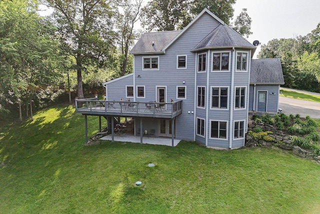 3 Laurel Ct, Galena, IL 61036 - back of house with a deck, a patio, a yard, and roof with shingles