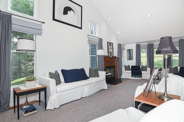 3 Laurel Ct, Galena, IL 61036 - living area featuring healthy amount of natural light, recessed lighting, a glass covered fireplace, and high vaulted ceiling