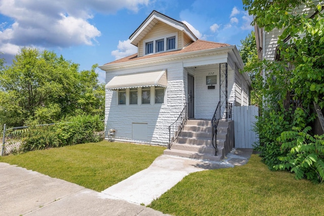 352 W 106th Pl, Chicago, IL 60628 - view of front of house featuring a front yard