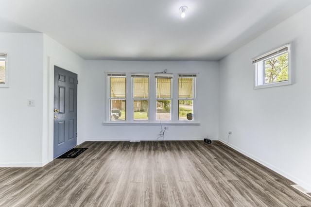 352 W 106th Pl, Chicago, IL 60628 - unfurnished room with wood finished floors and baseboards
