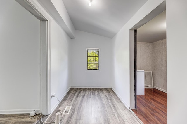 352 W 106th Pl, Chicago, IL 60628 - empty room with wood finished floors and vaulted ceiling