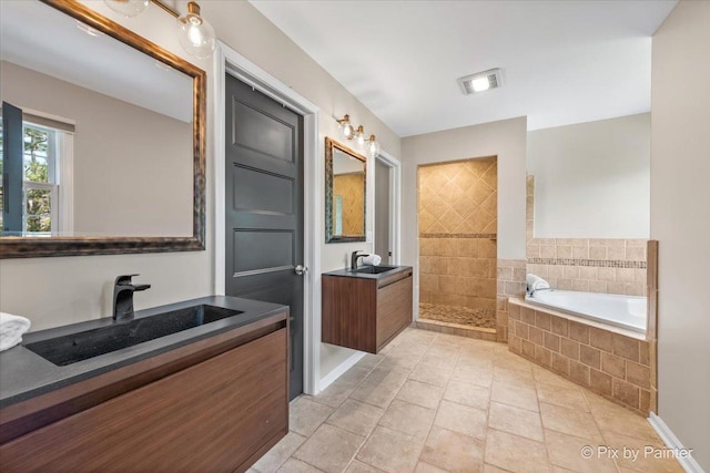 8980 Bardwell Ln, Lakewood, IL 60014 - bathroom with a bath, two vanities, and a tile shower