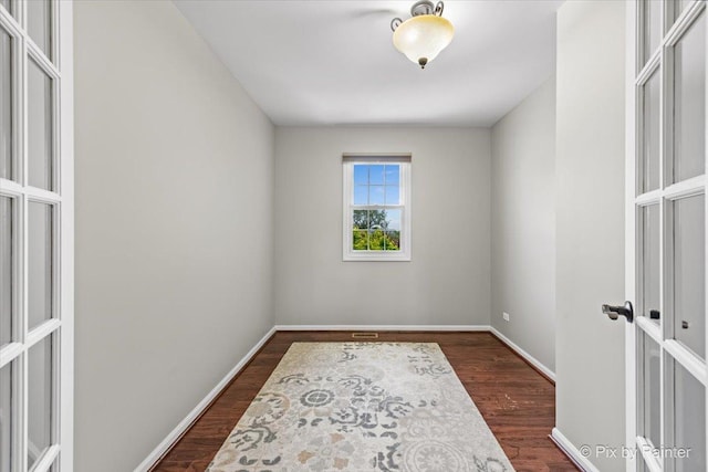 8980 Bardwell Ln, Lakewood, IL 60014 - empty room featuring dark wood-style flooring