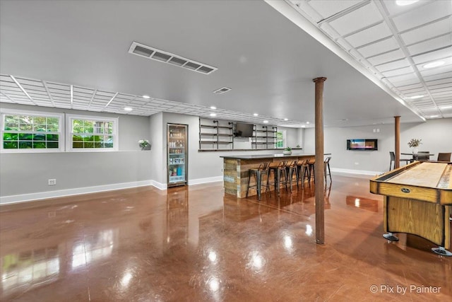 8980 Bardwell Ln, Lakewood, IL 60014 - rec room featuring bar area and baseboards