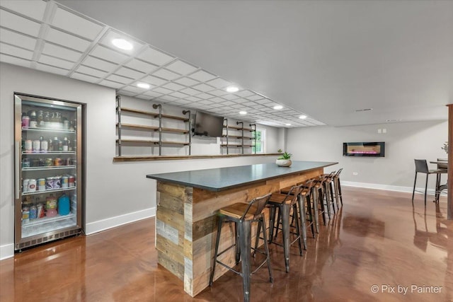 8980 Bardwell Ln, Lakewood, IL 60014 - indoor bar featuring finished concrete flooring and recessed lighting