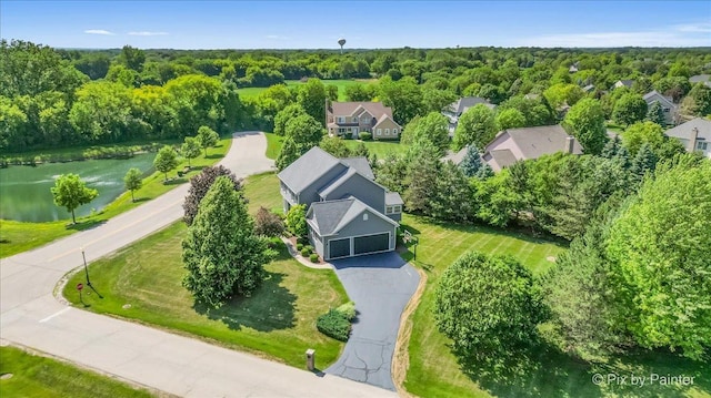 8980 Bardwell Ln, Lakewood, IL 60014 - drone / aerial view of a nearby body of water and a heavily wooded area