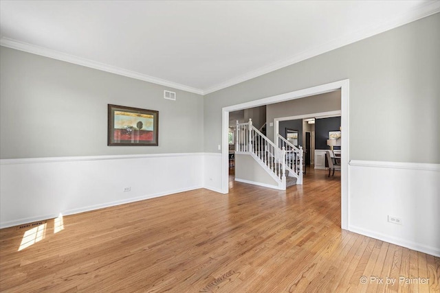 8980 Bardwell Ln, Lakewood, IL 60014 - unfurnished room with wood finished floors, crown molding, and stairs