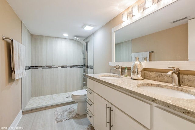5733 S Neenah Ave, Chicago, IL 60638 - bathroom featuring double vanity, walk in shower, and recessed lighting
