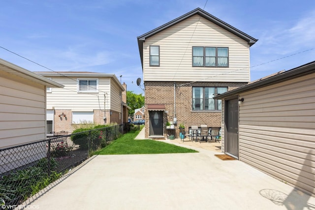 5733 S Neenah Ave, Chicago, IL 60638 - back of property with brick siding and a patio
