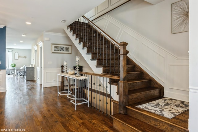 5733 S Neenah Ave, Chicago, IL 60638 - staircase with a decorative wall, wood finished floors, a wainscoted wall, crown molding, and recessed lighting