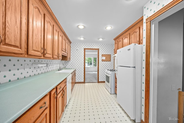 325 Douglas St, Oswego, IL 60543 - kitchen featuring white appliances, wallpapered walls, light floors, brown cabinets, and light countertops