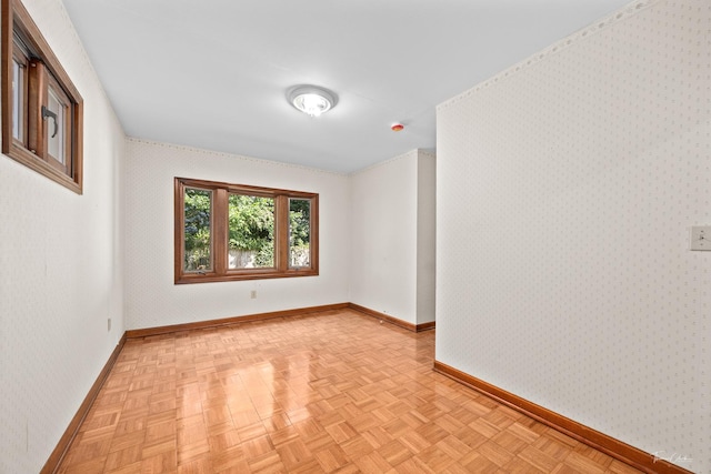 325 Douglas St, Oswego, IL 60543 - unfurnished room featuring baseboards and wallpapered walls