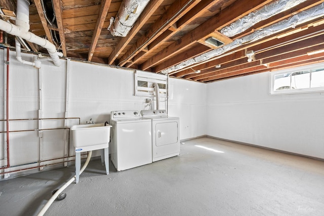 325 Douglas St, Oswego, IL 60543 - basement with washer and clothes dryer and a sink
