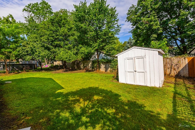 325 Douglas St, Oswego, IL 60543 - fenced backyard with a storage shed