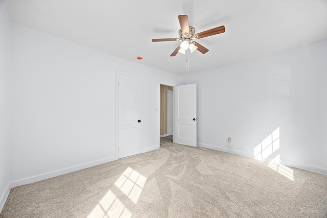 325 Douglas St, Oswego, IL 60543 - carpeted empty room with ceiling fan and baseboards