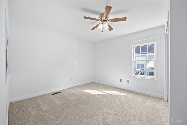 325 Douglas St, Oswego, IL 60543 - empty room featuring carpet flooring and ceiling fan