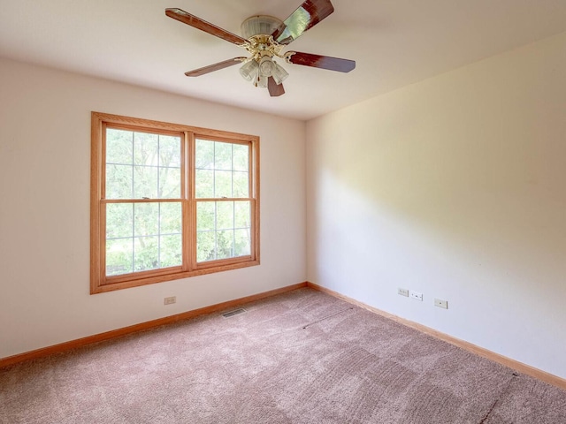 2207 Irvine Ln, Plainfield, IL 60586 - unfurnished room with light colored carpet and ceiling fan