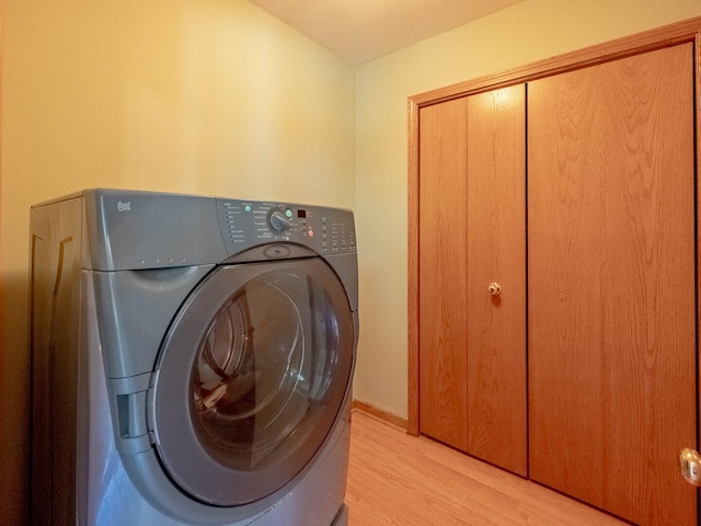 2207 Irvine Ln, Plainfield, IL 60586 - laundry room featuring washer / clothes dryer and light wood finished floors