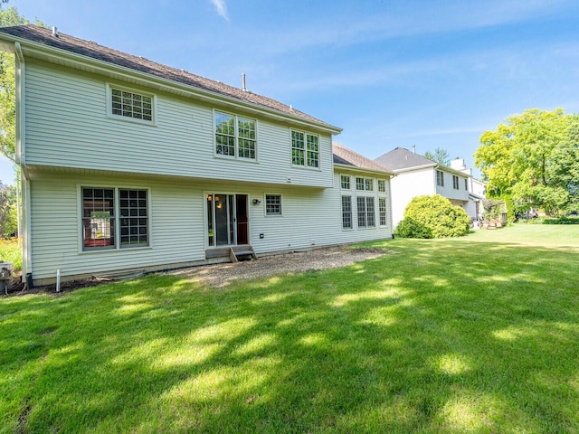 2207 Irvine Ln, Plainfield, IL 60586 - rear view of property with a yard and entry steps