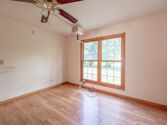 2207 Irvine Ln, Plainfield, IL 60586 - spare room with light wood-style floors and ceiling fan
