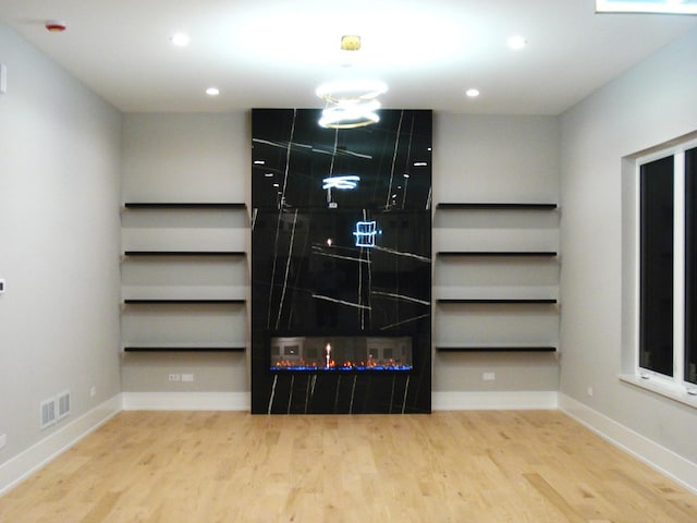 7137 S 87th Ave S, Justice, IL 60458 - unfurnished living room with wood finished floors and recessed lighting