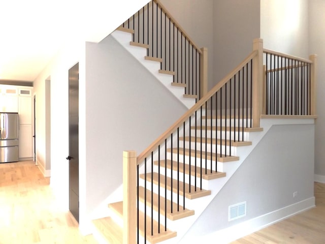 7137 S 87th Ave S, Justice, IL 60458 - stairs with wood finished floors and a towering ceiling