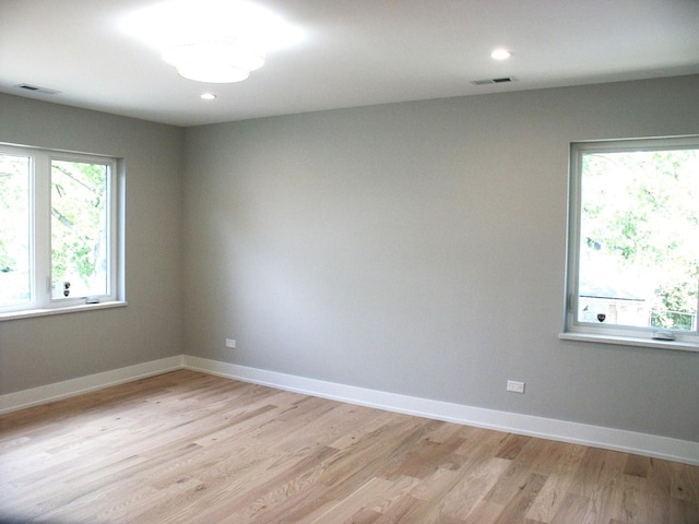 7137 S 87th Ave S, Justice, IL 60458 - spare room with light wood-style floors and recessed lighting