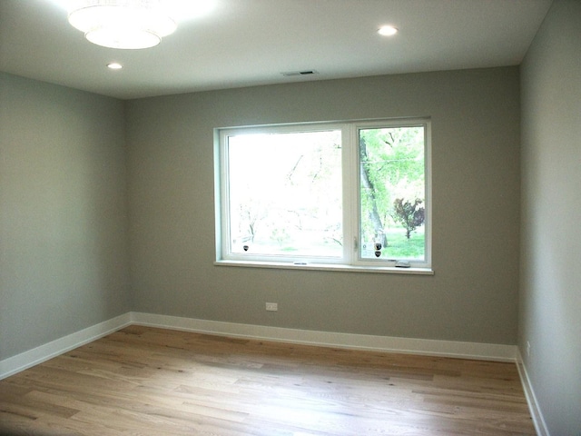7137 S 87th Ave S, Justice, IL 60458 - spare room with light wood-style flooring and recessed lighting