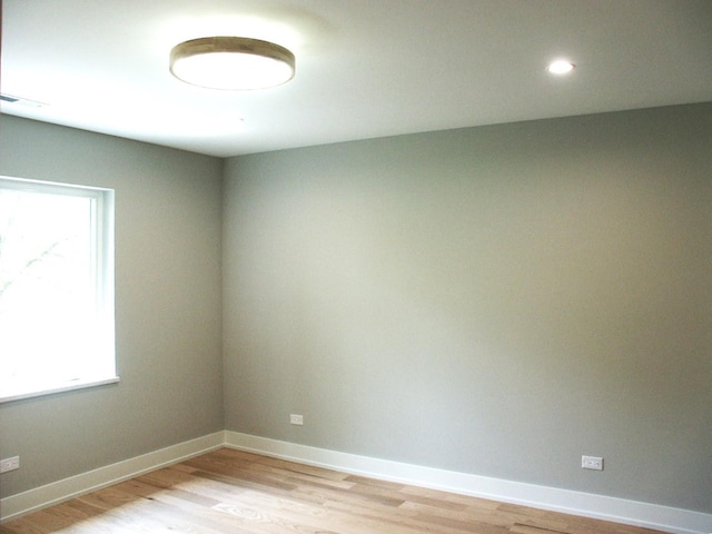 7137 S 87th Ave S, Justice, IL 60458 - empty room with light wood-type flooring and recessed lighting