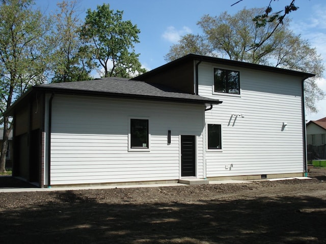 7137 S 87th Ave S, Justice, IL 60458 - rear view of property featuring roof with shingles