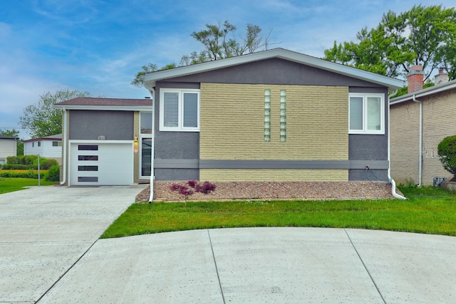 9810 N Lauren Ln, Niles, IL 60714 - view of side of property featuring concrete driveway and stucco siding