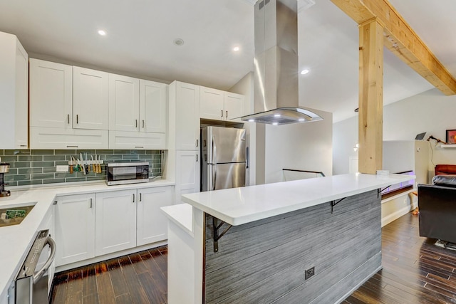 9810 N Lauren Ln, Niles, IL 60714 - kitchen with island range hood, appliances with stainless steel finishes, dark wood finished floors, a kitchen bar, and recessed lighting