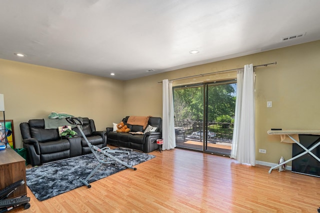 629 N Carroll Pkwy Unit 207, Glenwood, IL 60425 - living area with wood finished floors and recessed lighting