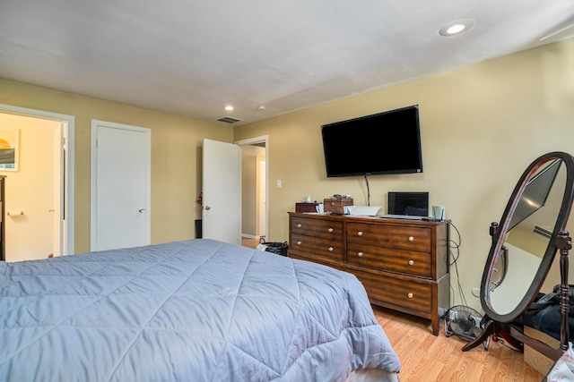 629 N Carroll Pkwy Unit 207, Glenwood, IL 60425 - bedroom with wood finished floors and recessed lighting