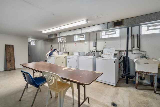 629 N Carroll Pkwy Unit 207, Glenwood, IL 60425 - community laundry featuring washer and dryer and healthy amount of natural light