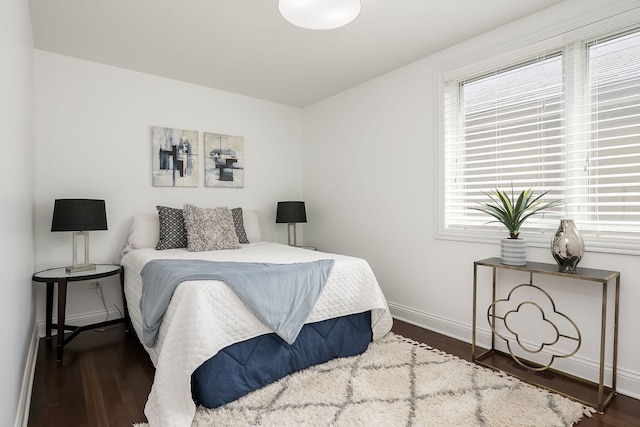 2128 N Winchester Ave, Chicago, IL 60614 - bedroom with multiple windows and wood finished floors