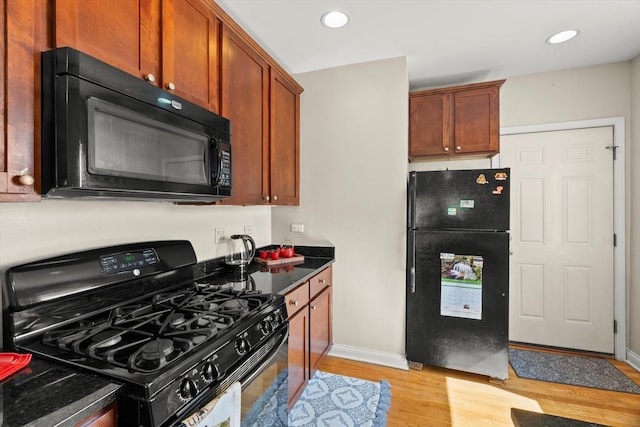 50 Forest Ave Unit 2S, Riverside, IL 60546 - kitchen featuring black appliances, light wood-style floors, and recessed lighting