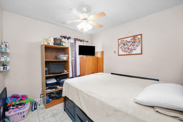 4624 W Montana St, Chicago, IL 60639 - bedroom featuring light marble finish flooring and ceiling fan
