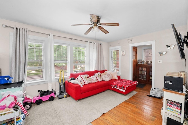 4624 W Montana St, Chicago, IL 60639 - living area featuring a ceiling fan and light wood finished floors