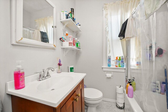 4624 W Montana St, Chicago, IL 60639 - full bathroom with vanity, tile patterned floors, and shower / bath combo