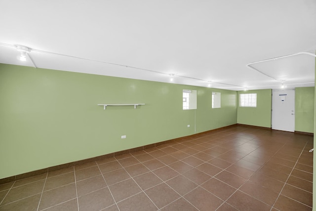 5736 S Honore St, Chicago, IL 60636 - unfurnished room with dark tile patterned floors