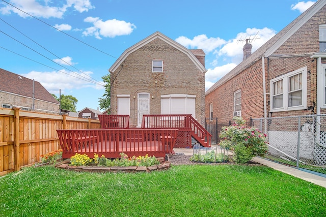 5736 S Honore St, Chicago, IL 60636 - rear view of house with brick siding, a deck, a fenced backyard, and a detached garage