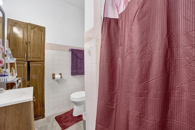 7515 S E End Ave, Chicago, IL 60649 - bathroom with vanity, tile walls, tile patterned floors, and a shower with curtain