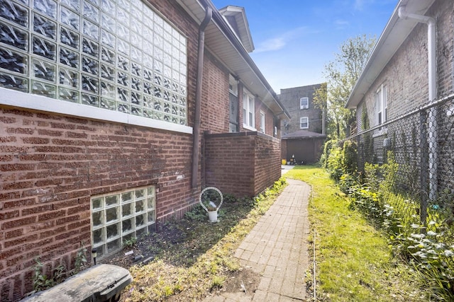 7515 S E End Ave, Chicago, IL 60649 - view of side of home featuring brick siding