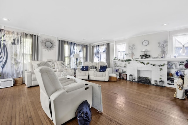 7515 S E End Ave, Chicago, IL 60649 - living area featuring plenty of natural light, hardwood / wood-style floors, and a brick fireplace